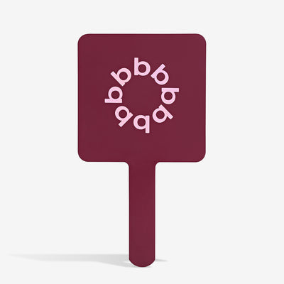 THE BURGUNDY FACE MIRROR