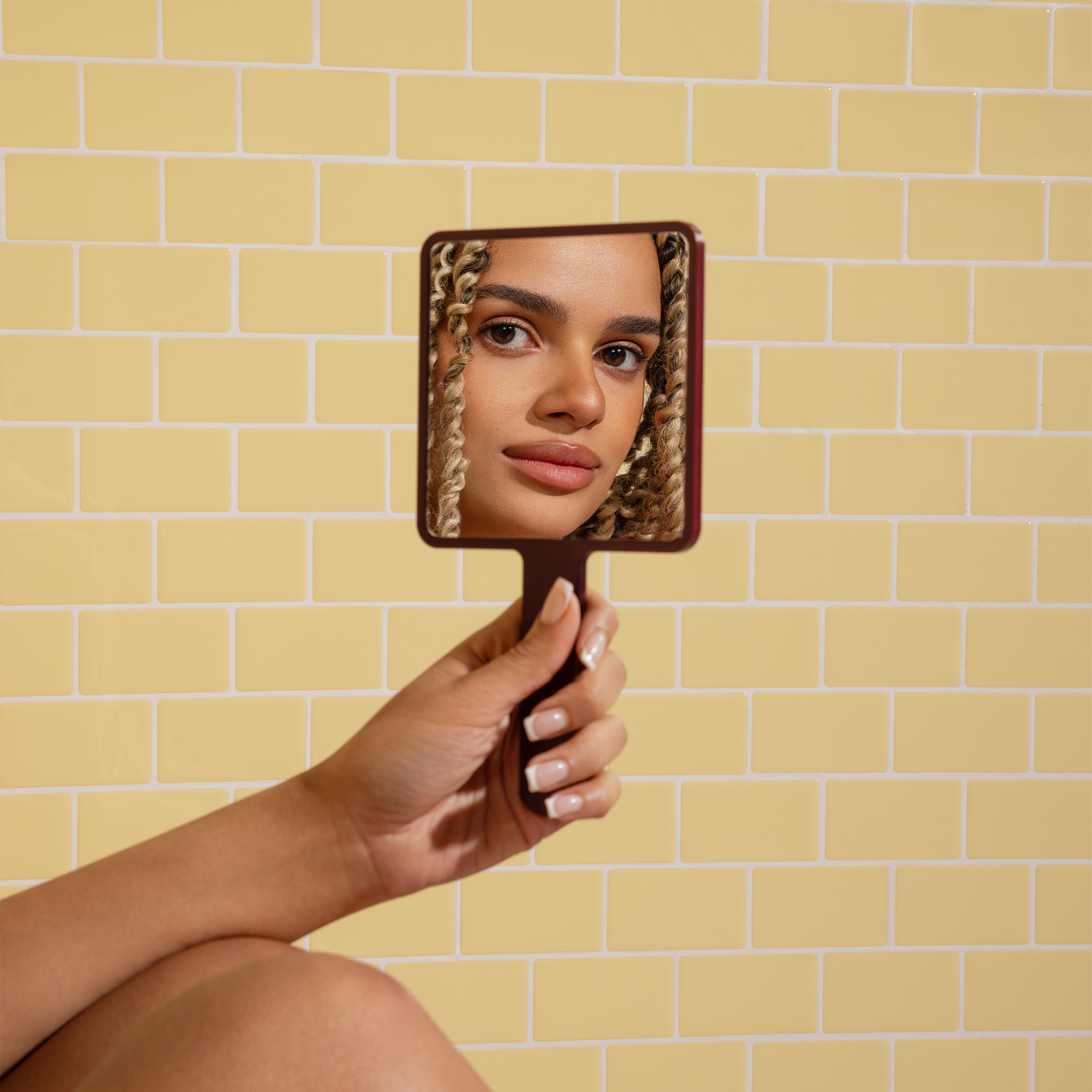 THE BURGUNDY FACE MIRROR