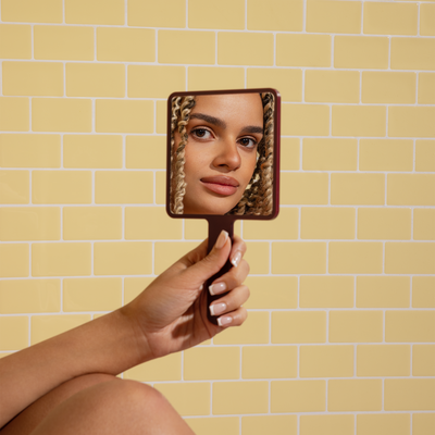 THE BURGUNDY FACE MIRROR